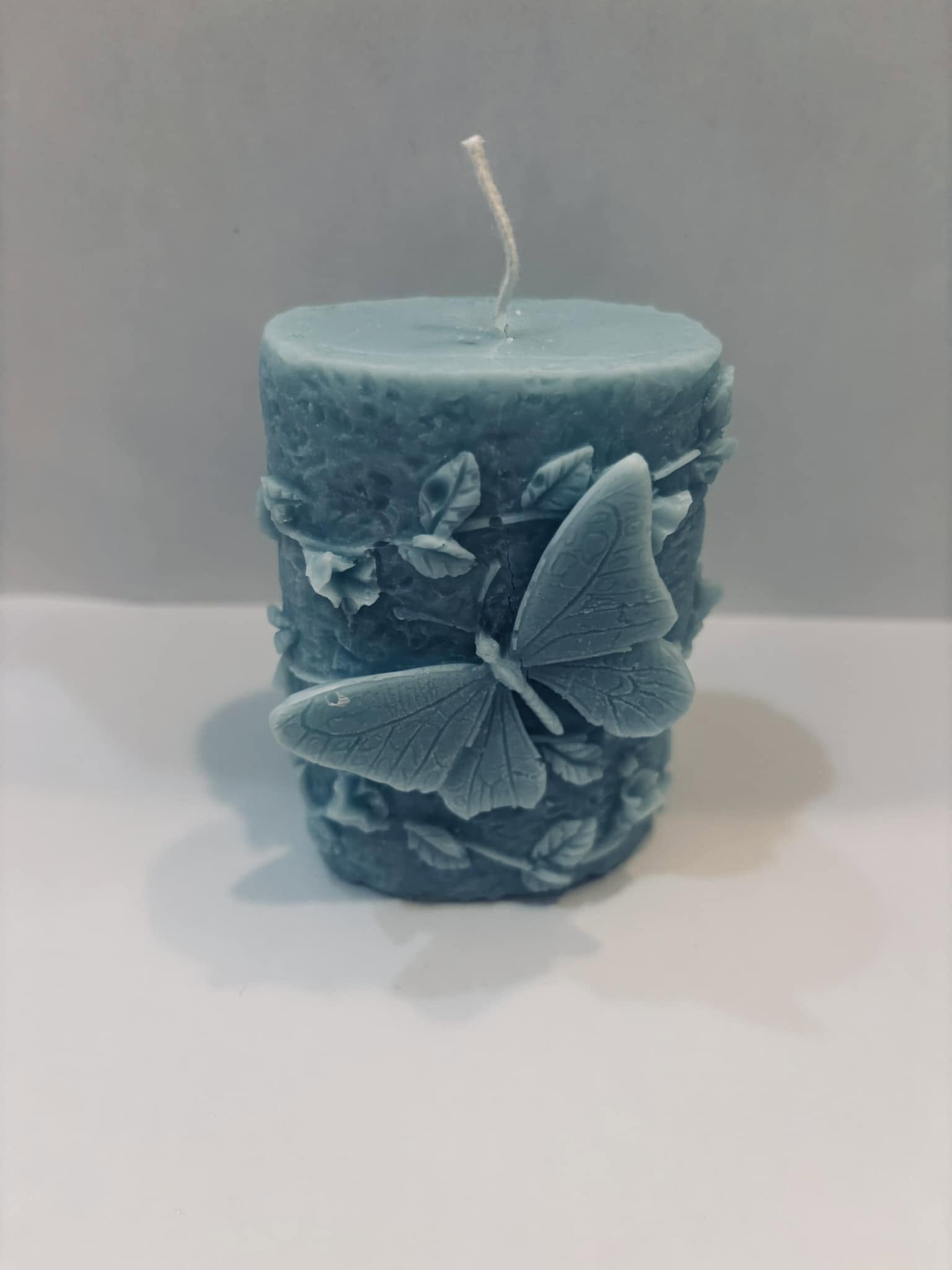 Chandelle papillon bleue, détail