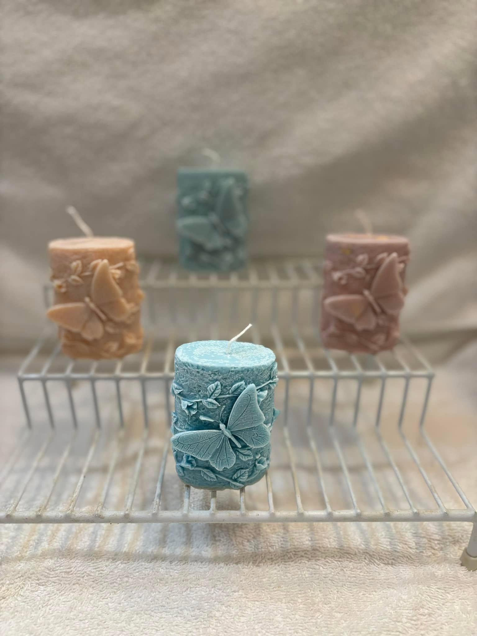 Chandelles papillon dans quatre teintes